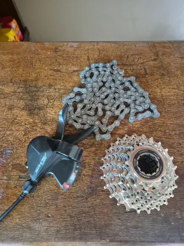 Transmissão shimano 9v k7, corrente e passador novo