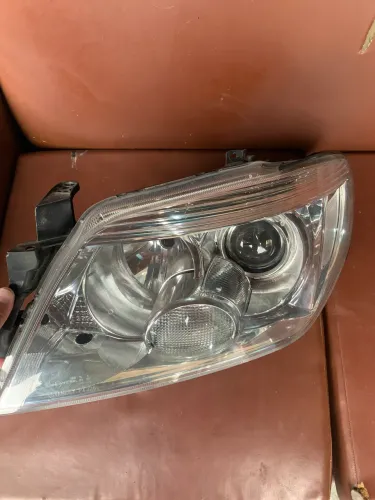 Farol Pajero TR4 2010 até 2015 motorista