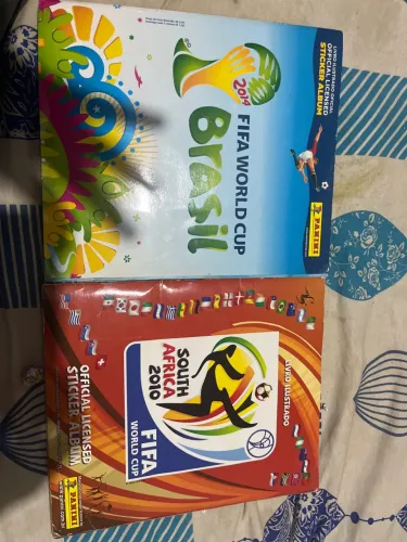Vendo álbum da copa completo 2010 e 2014