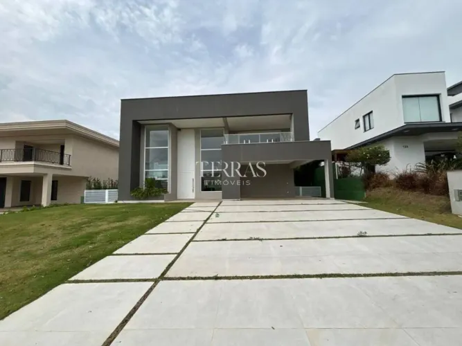 Casa com 4 dormitórios à venda, 508 m² por R$ 5.900.000 - Condomínio Portal Japy Golf Club