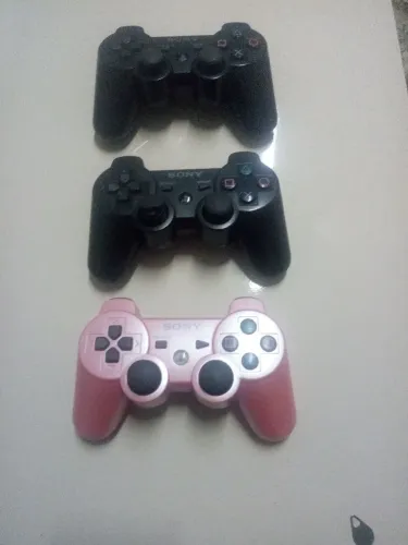 Controles de ps3 originais funcionando só no cabo só é trocar a bateria 