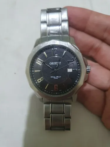Relogio orient original marca de uso mas vende longo 50 funcionando tudo