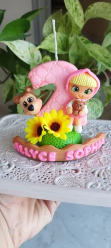 Lembrancinhas e vela em biscuit