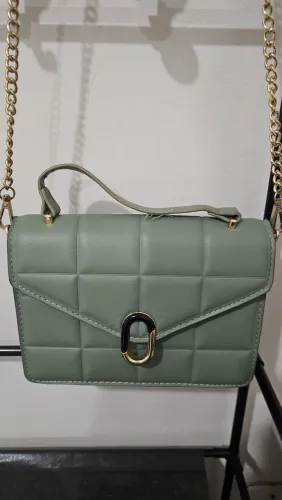 bolsa transversal matelassê verde