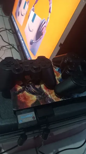Vendo playstation 2 completo com dois controles 10 jogos e memória cardi