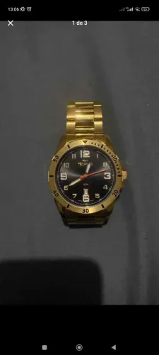 Relógio technos dourado zero