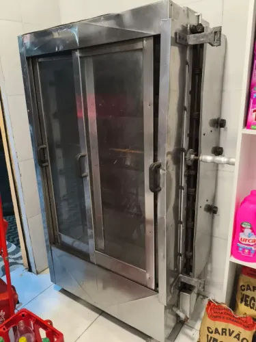 Vendo máquina de frangos semi nova