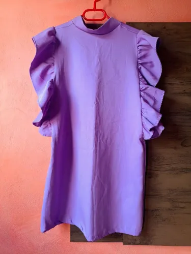 Bazar vestido na cor lilás ? Tamanho M