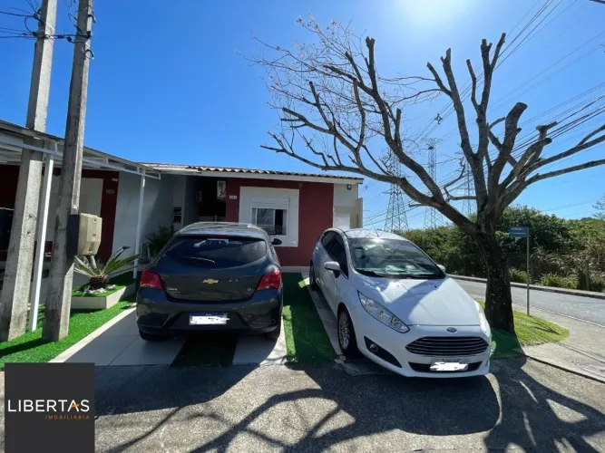 Casa com 3 quartos e 2 vagas em Alvorada no Condomínio Terra Nova