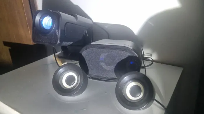 Projetor em otimo estado esmart 4kvai com controle remoto original cont *pra sairho