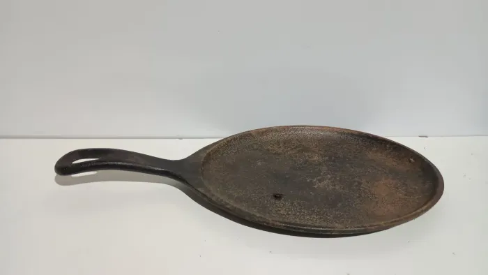 chapa oval de ferro fundido -  medida externa 37 cm 