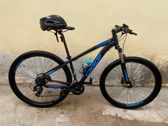 Bicicleta Aro 29 OGGI Hacker HDS Preto/Azul Câmbio Shimano