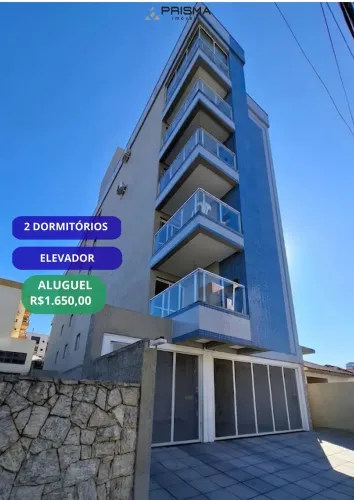 Apartamento, 2 dormitórios com garagem, elevador, Res São Carlos, próximo ao Fór