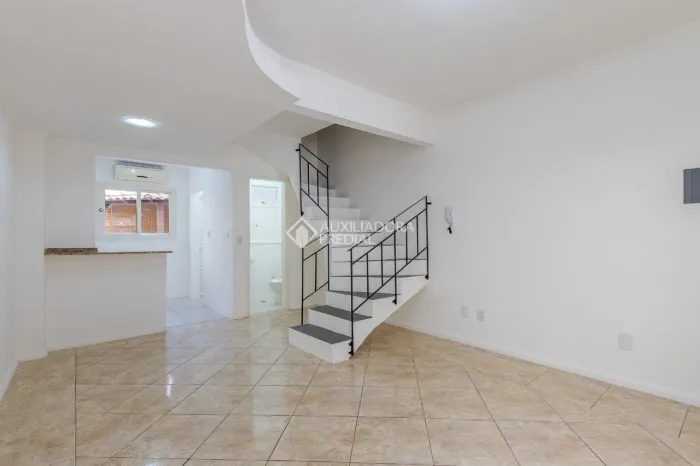 Casa semi mobiliada em condomínio fechado com 2 quartos no Bairro Rio Branco Canoas