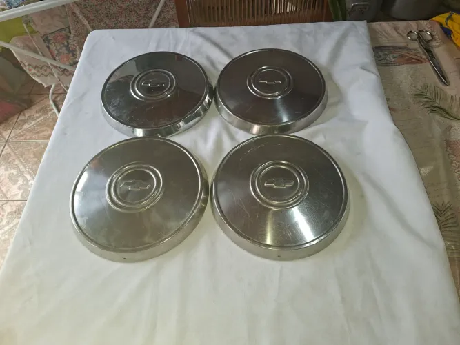 3 Trres Calotas Gm chevrolet em inox e 1 uma  cromada