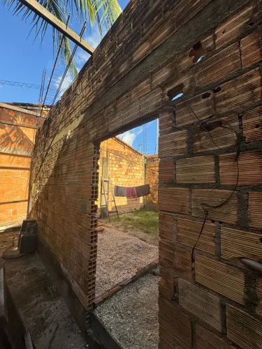 Vendo terreno com construção