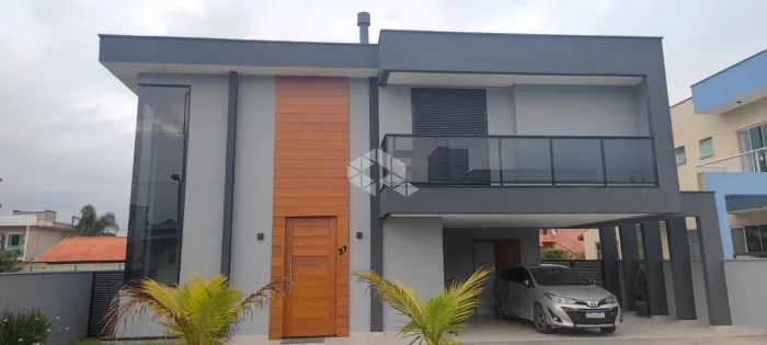 CASA ALTO PADRÃO NO CONDOMÍNIO ILHA DO CORAL - 4 SUÍTES E FINANCIÁVEL