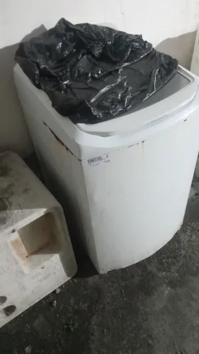 Máquina de lavar com defeito