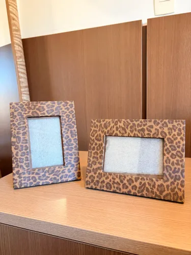 Porta retratos de onça