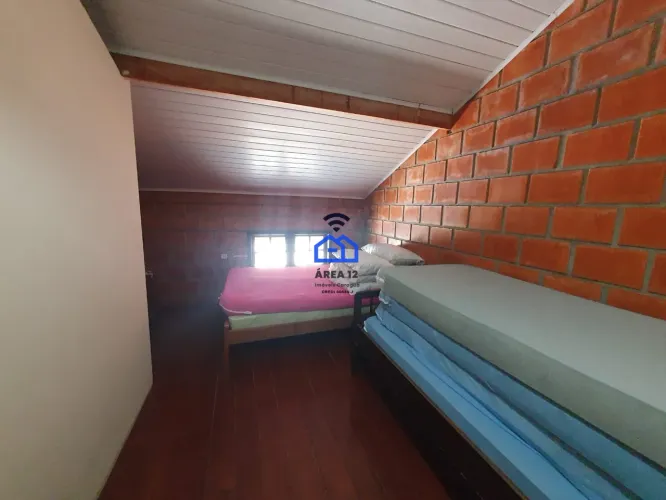 Sobrado à venda em condomínio na Martim de Sá - dois dormitórios, sala com 2 ambientes, qu
