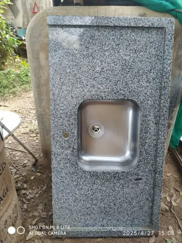 Pia de granito com cuba de aço inox