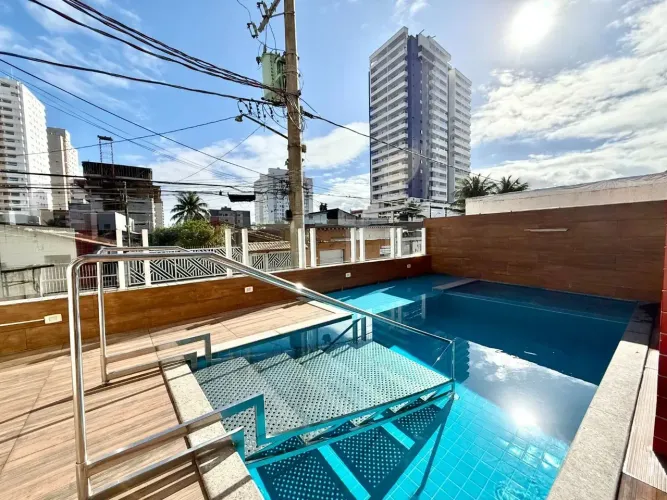 Imóvel para venda possui 64 metros quadrados com 2 quartos em Aviação - Praia Grande - SP