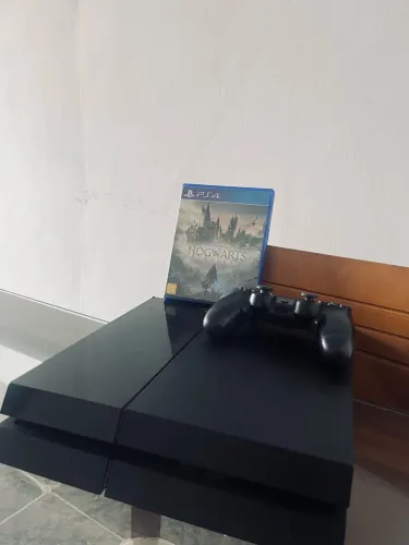 Vendo PS4 Fat 500GB em excelente estado 