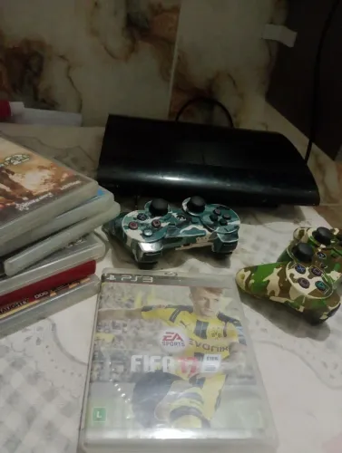 Vendo ps3 todo bom com 7 jogos e dois controles