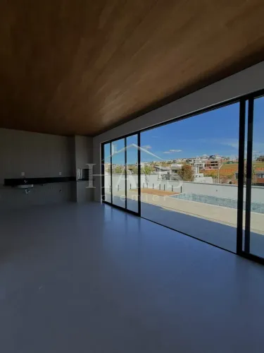 Casa com arquitetura contemporânea no Alphaville em Juiz de Fora (MG): Assinatura Ana Paul