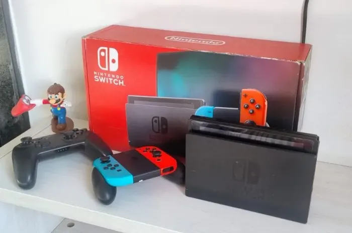 Nintendo Switch V2 completo + pro controller + cartão 128gb + 3 jogos físicos e 3 digitais