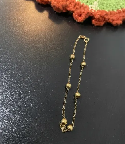 Pulseira louro 750 em bolinhas