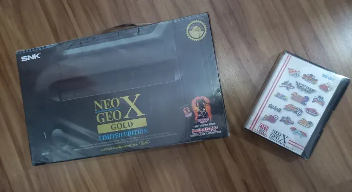 NEO GEO X GOLD EDITION MAIS PACK DE JOGOS PRATICAMENTE SEM USO FUNCIONAL 100% VEJA FOTOS
