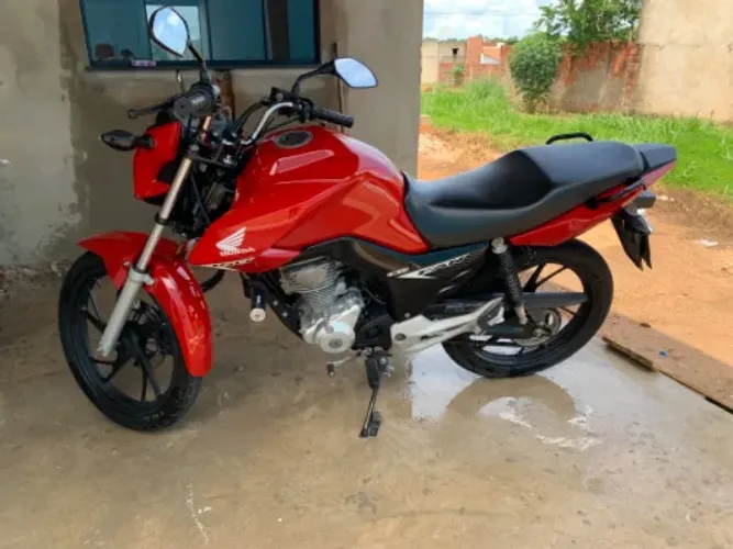 Fan 160 2021 cor vermelha 58000 km 2 dono moto bem conservada e quitado chama nós aí Pra
