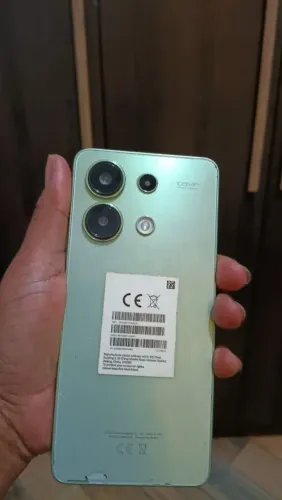 celular redmi 13 com câmera ruim , precisa trocar a tela 
