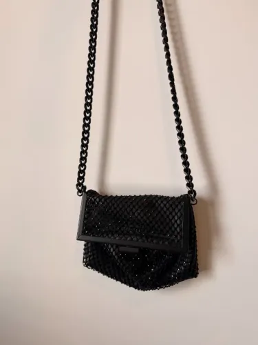 Bolsa tiracolo john john preta