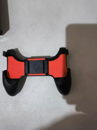 Game Handle (suporte de mão ou grip) ergonômico para smartphones,