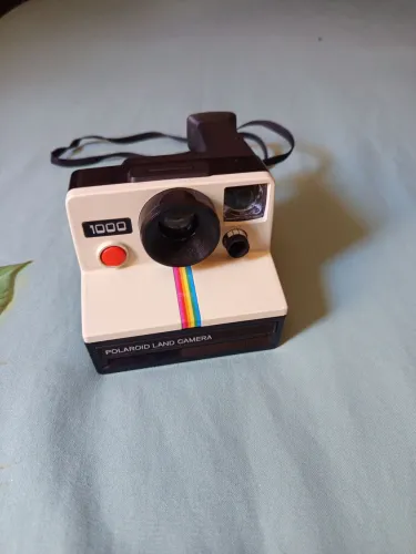 Máquina fotográfica Polaroid land 1000