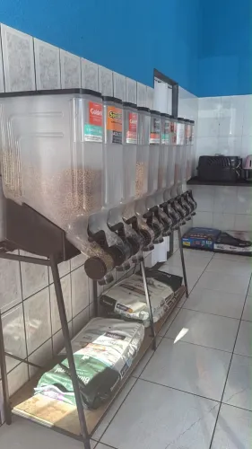 Dispenser de rações para venda à granel