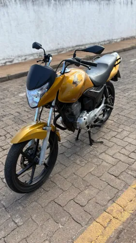 Honda CG 150 Titan EX ano/modelo 2012, dourada, moto em excelente estado de conservação