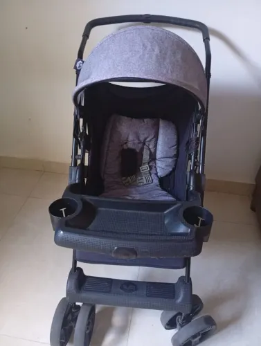 Carrinho de bebê com bebê conforto ?
