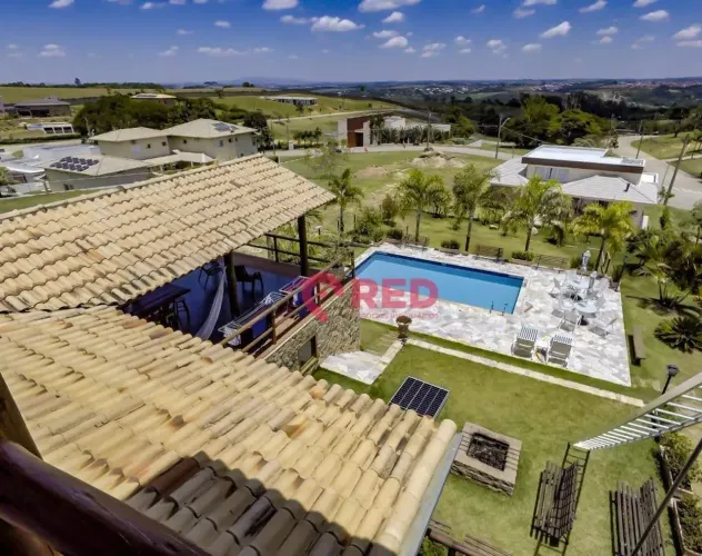 Casa com 5 dormitórios à venda, 450 m² por R$ 4.000.000,00 - Condomínio Fazenda Kurumin -