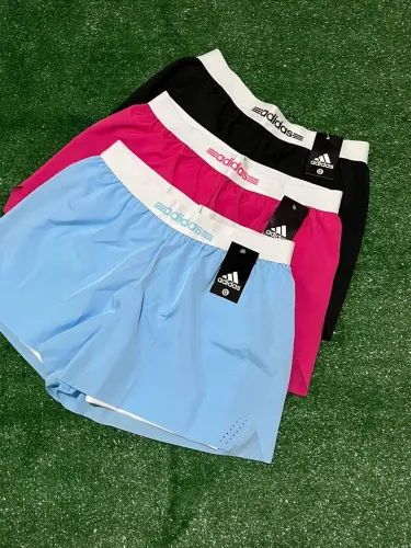 Shorts Duplo Adidas feminino