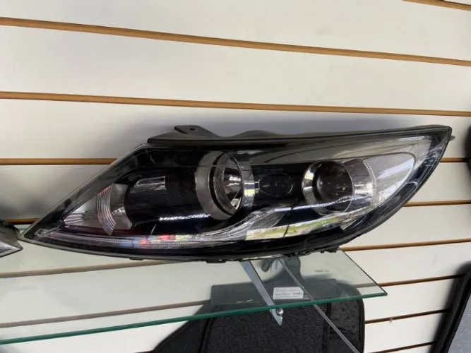 Farol Kia Sportage LE