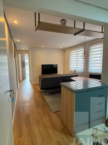 Apartamento mobiliado com 1 dormitório e 1 vaga em prédio com lazer próximo ao Shopping Hi