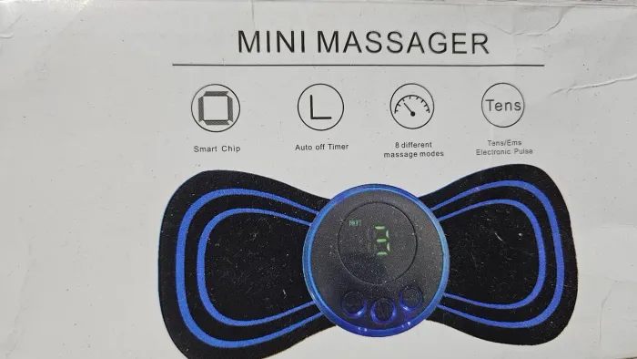 Mini massageador eletrico
