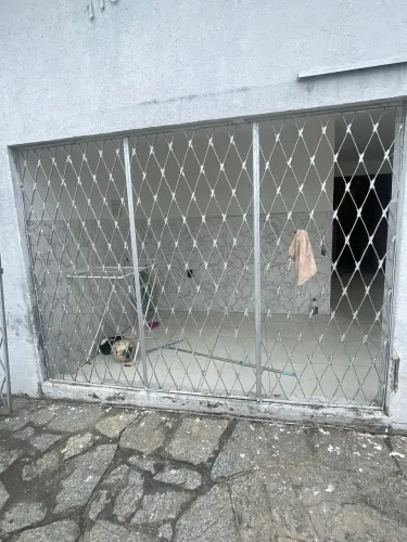GRADES EM FERRO FIXA E CORREDIÇA 