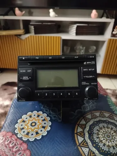 Vendo rádio p Tucson Hyundai 2010.