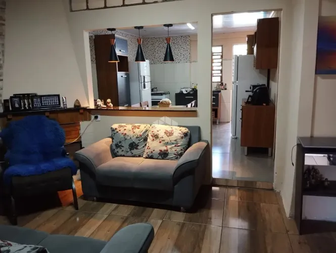 Casa com 3 dormitório, 2 banheiros, piscina aquecida e placa solar à Venda em Santana do L