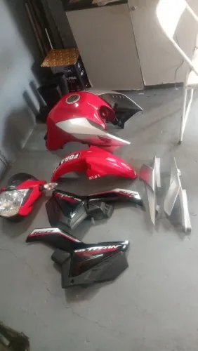 Tanque e roupa da Titan 160 23