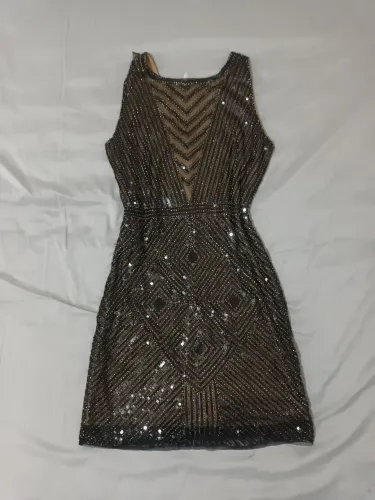 Vestidos e macacão brilho TAM 42
